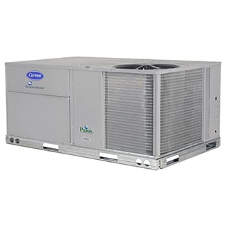 A large air conditioner unit sitting on top of a platform.